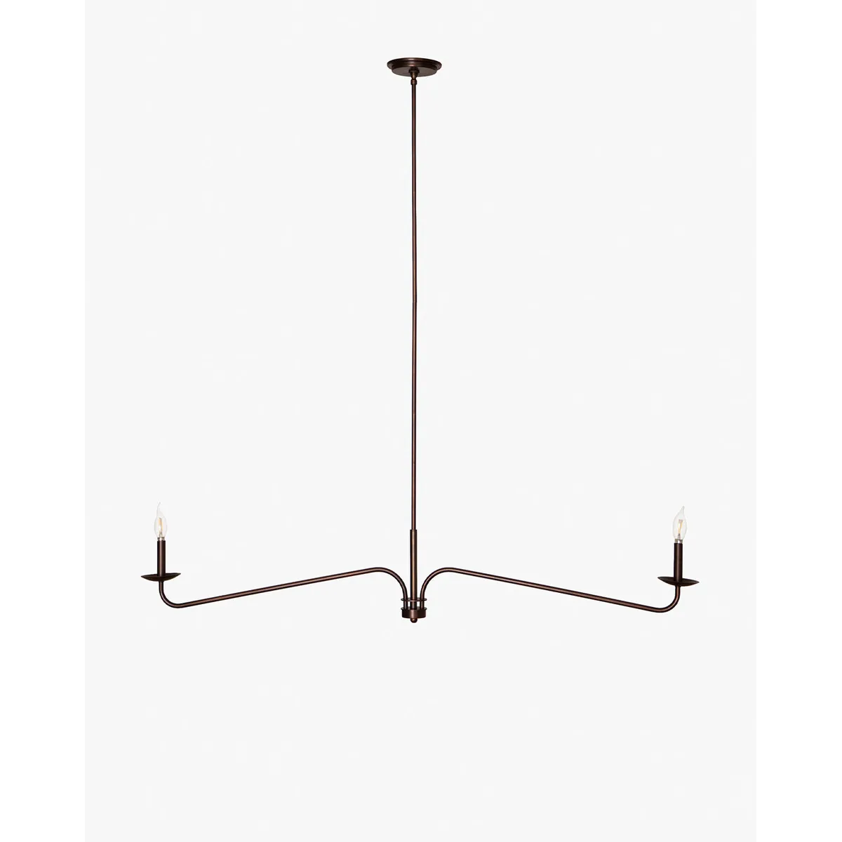 Linear chandelier suited to a long rectangular dining table